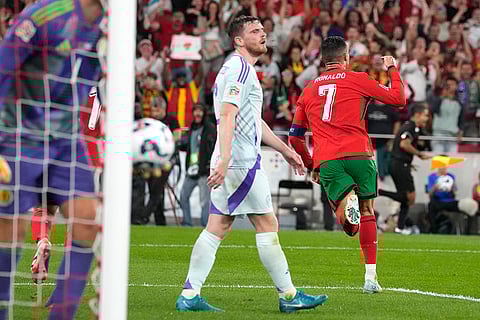 2024–25 UEFA Nations League, Portugal vs Scotland: Cristiano Ronaldo, right, celebrates after scoring his side's second goal